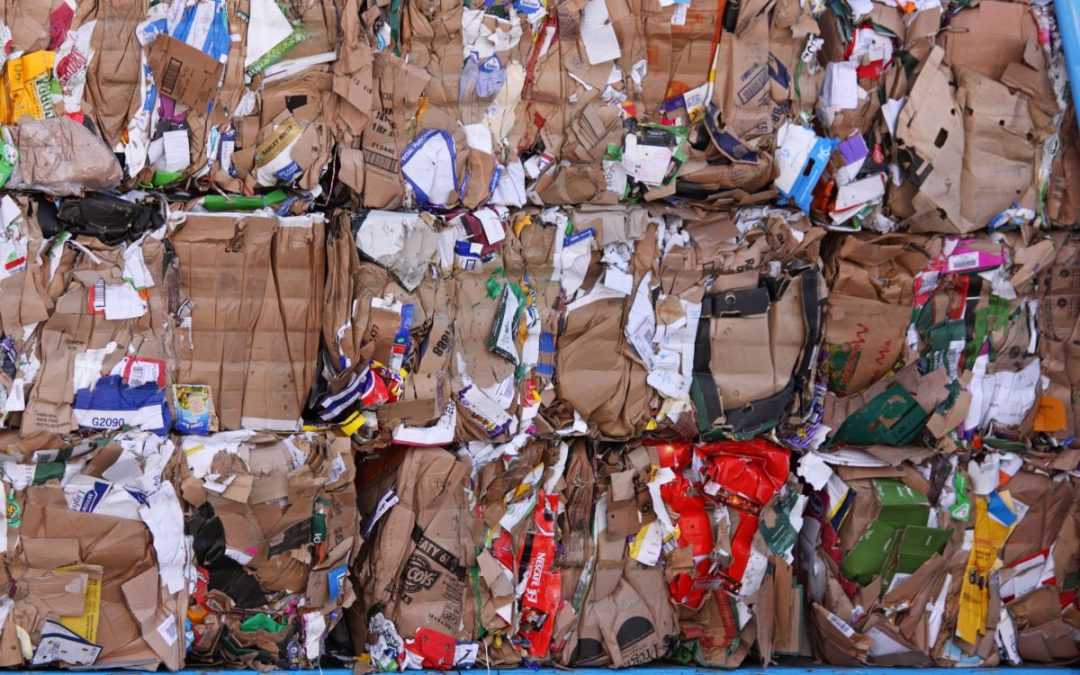 Piles of waste paper and cardboard ready for recycling