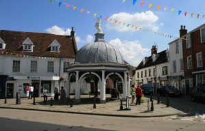 Bungay Buttercross and surrounding buildings with colourful bunting