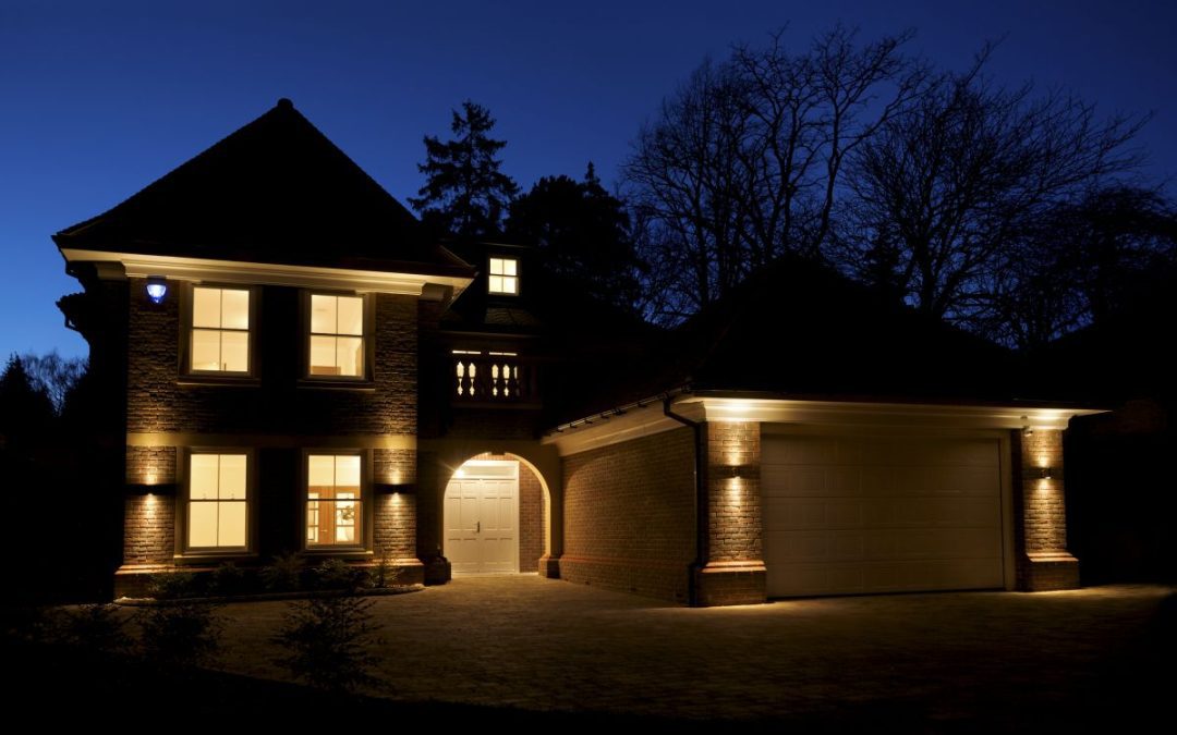 A external view of a well lit house at night