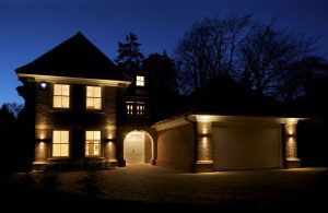 A external view of a well lit house at night