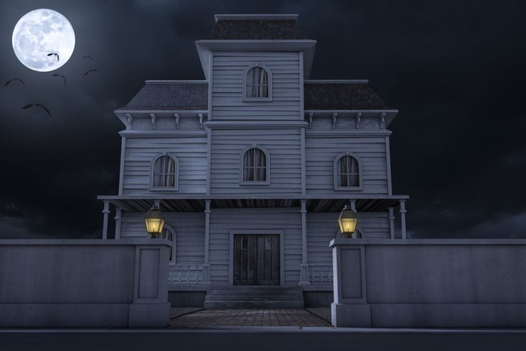 A spooky night time illustration of a scary house with a full moon and bats
