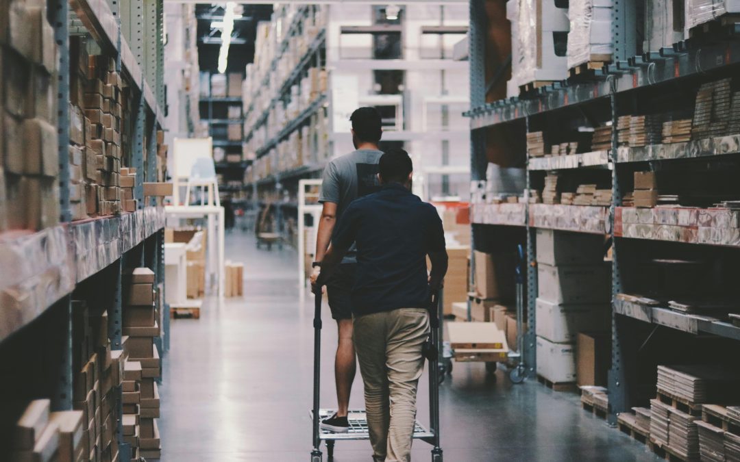 Men Going Around a Warehouse